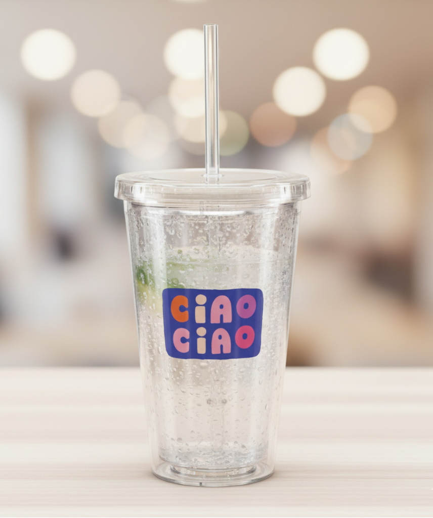 Clear tumbler with colorful 'Ciao Ciao' label on a blurred background